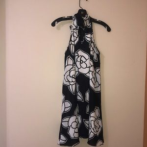 Black and white floral dress with halter neck.
